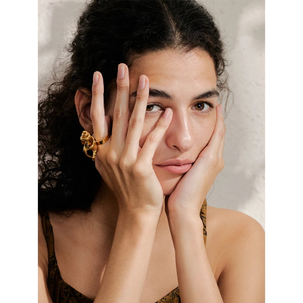 Adjustable ring size showing stainless steel jewellery with gold finish