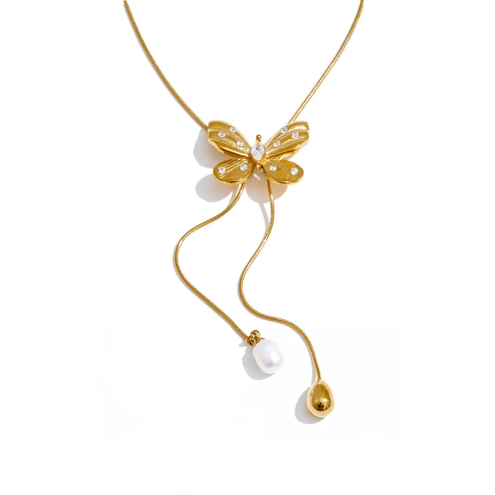 Butterfly pearl pendant necklace with polished gold plated shine
