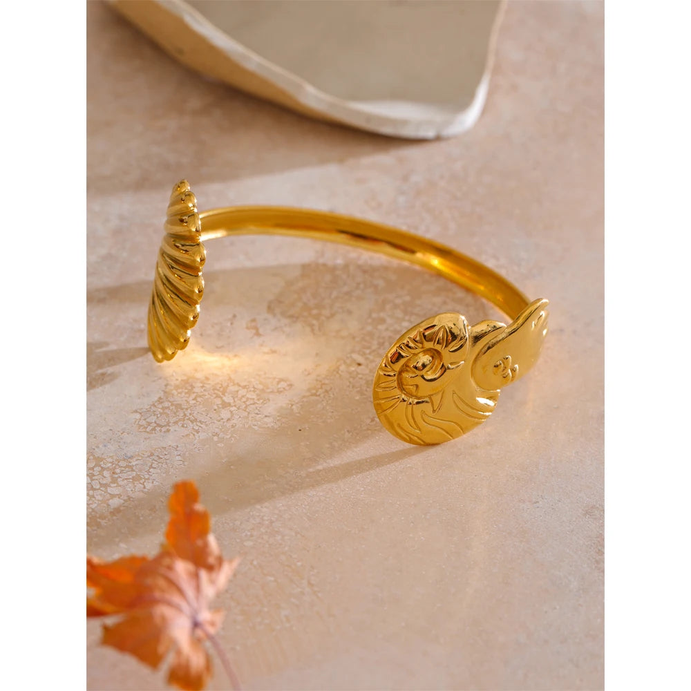 Close shot of waterproof jewelry surface on a cuff gold bangle