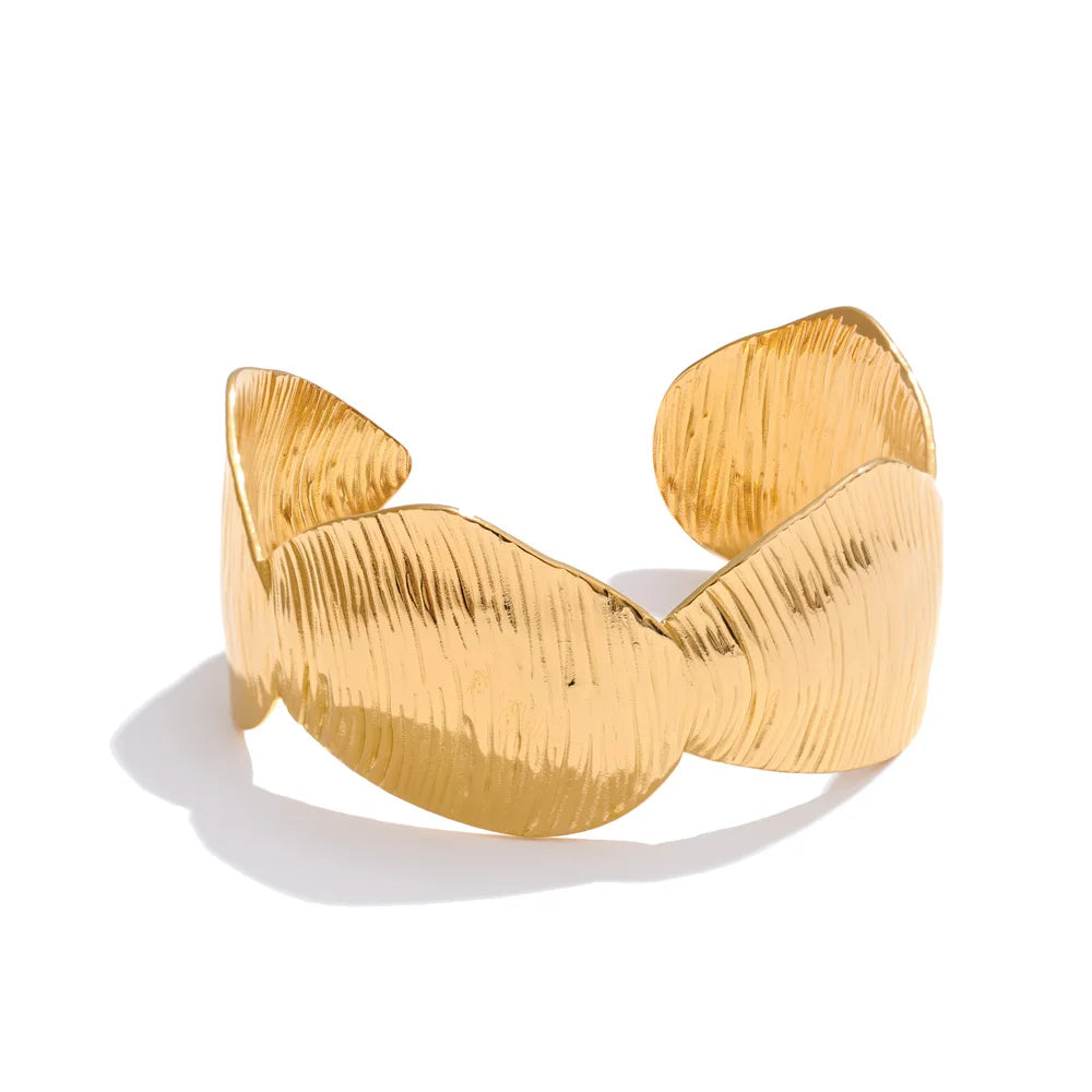 Textured light reflecting on waterproof jewelry gold bracelet gold finish