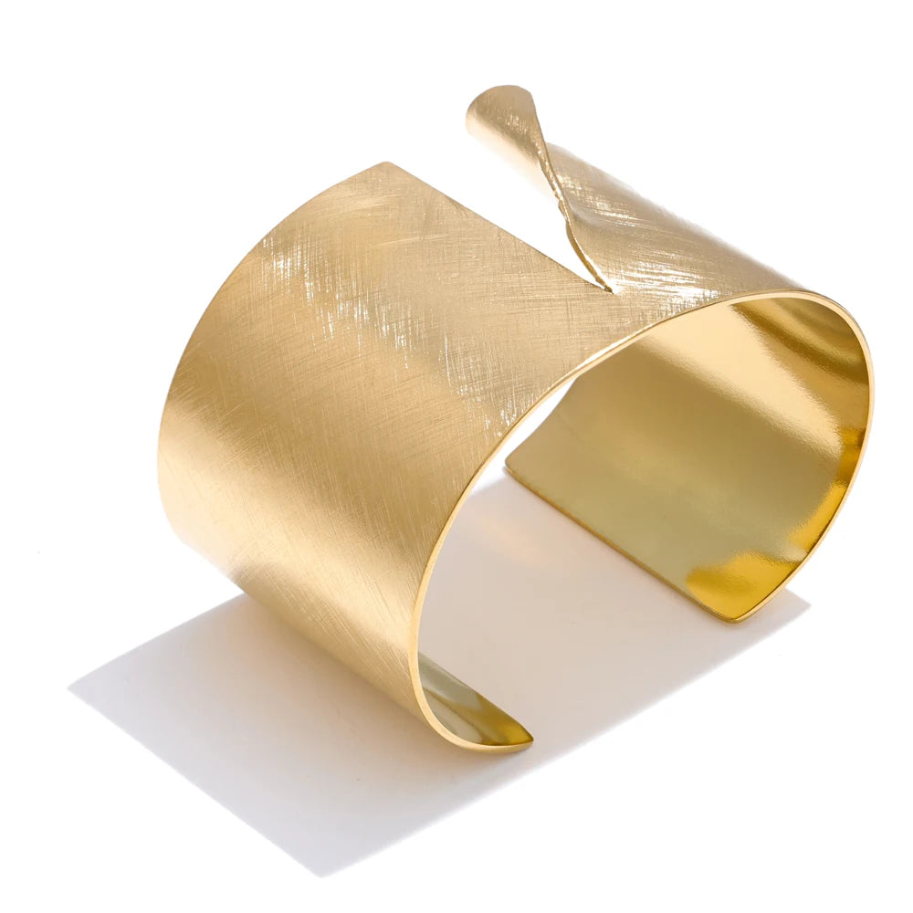 Side angle highlighting 60mm width and polished bracelet with gold tone