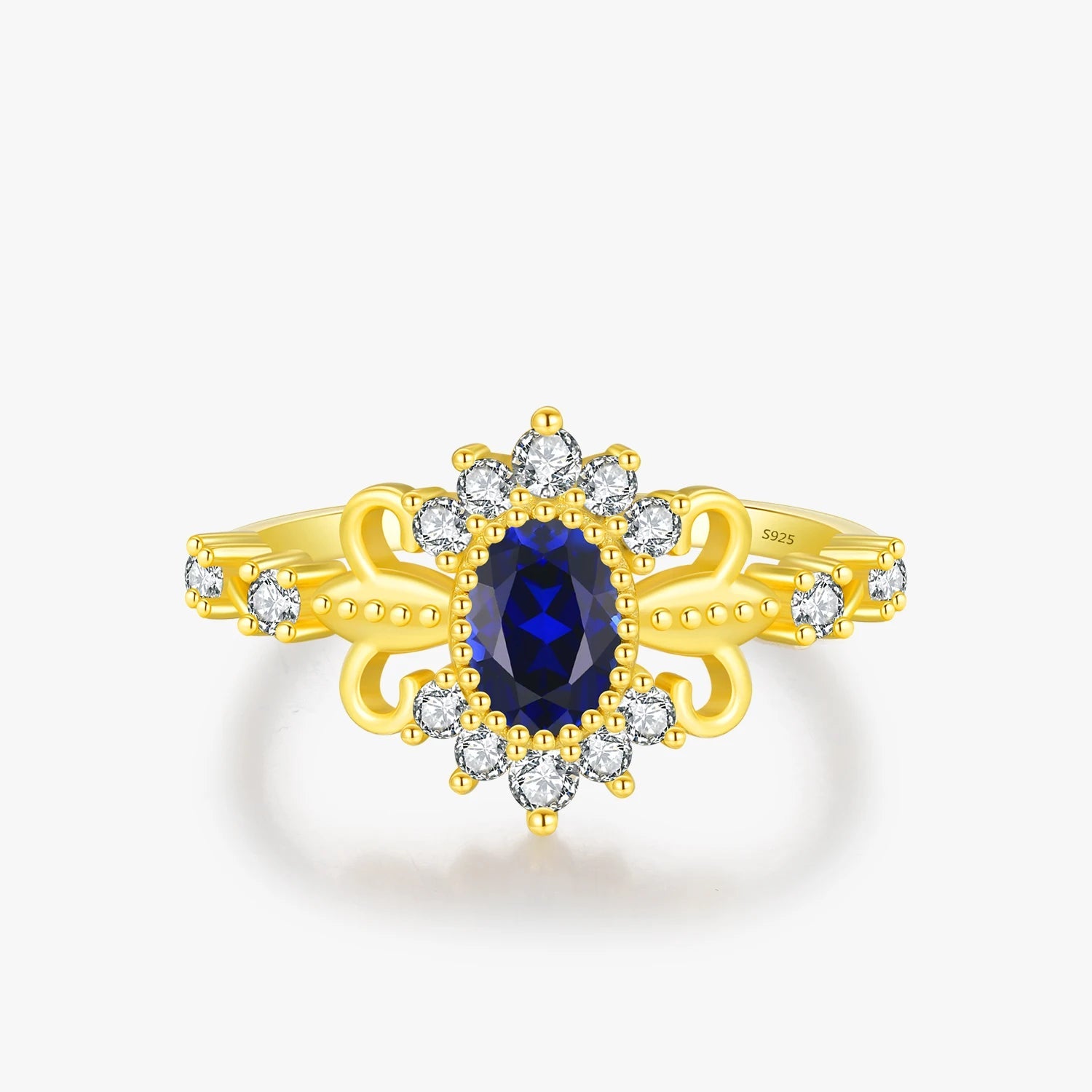 Retro crown charm ring in 925 sterling silver with blue oval zirconia