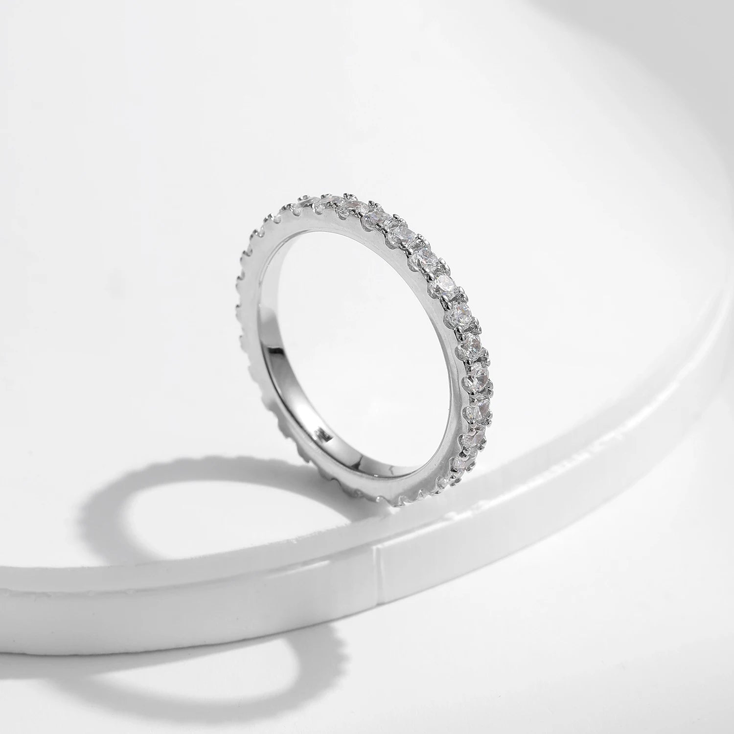 Close up wedding ring highlighting ring moissanite brilliance