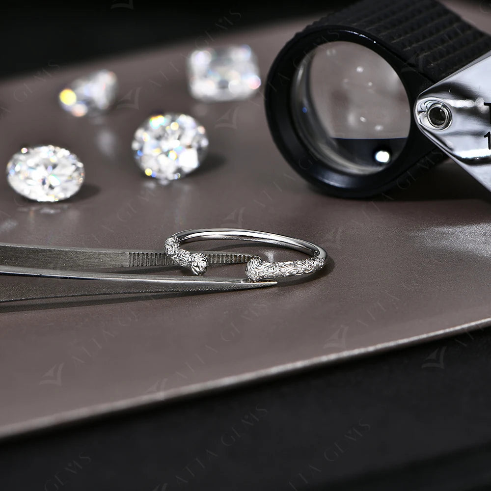 Gold ring with engraved pattern in sterling silver band