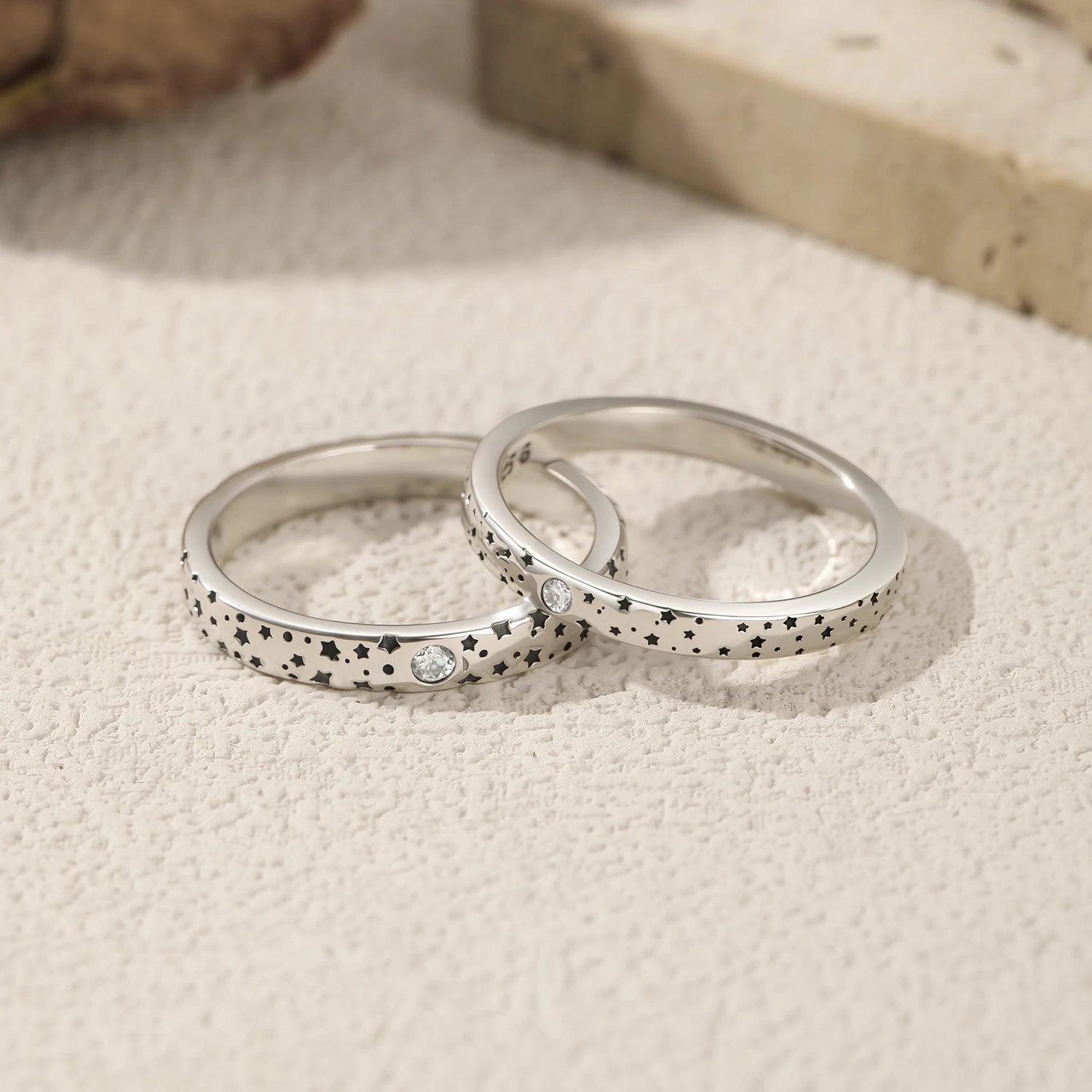 Sterling silver couple ring with D color moissanite and star accents