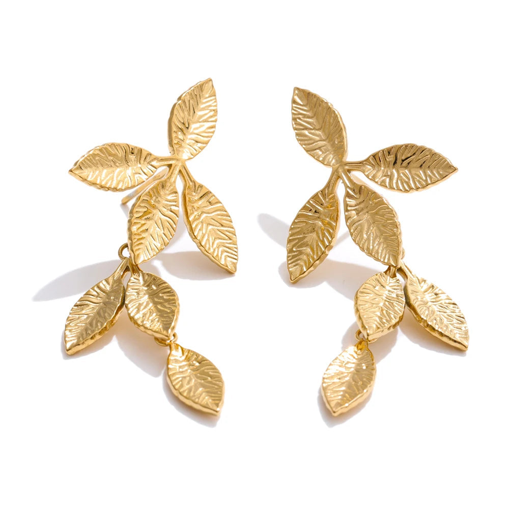 Gold plated leaf drop earrings with polished stainless steel shine
