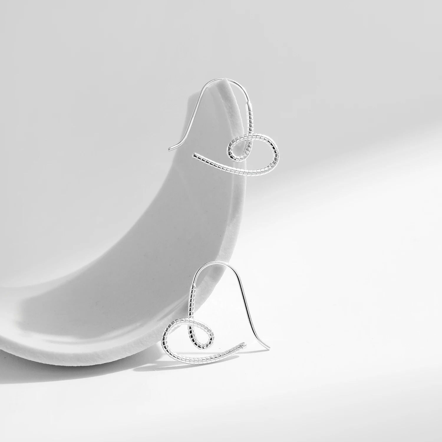 Silver heart hoop earrings vintage style for love and elegance