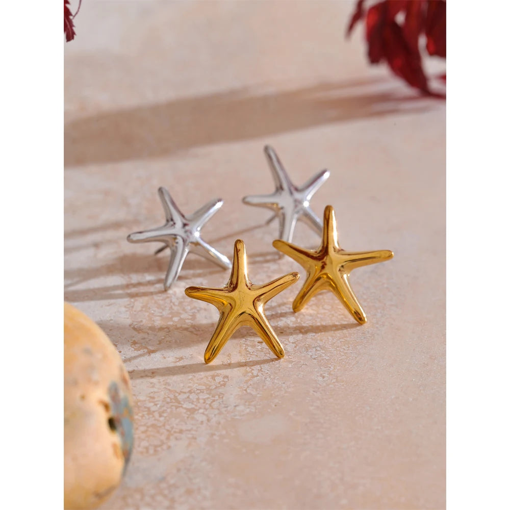 Stud earrings in a gold earrings glow shown with waterproof jewelry detail