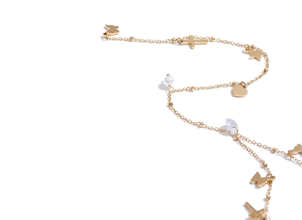 Long drop necklace showing butterfly and pearl accent for daily wear