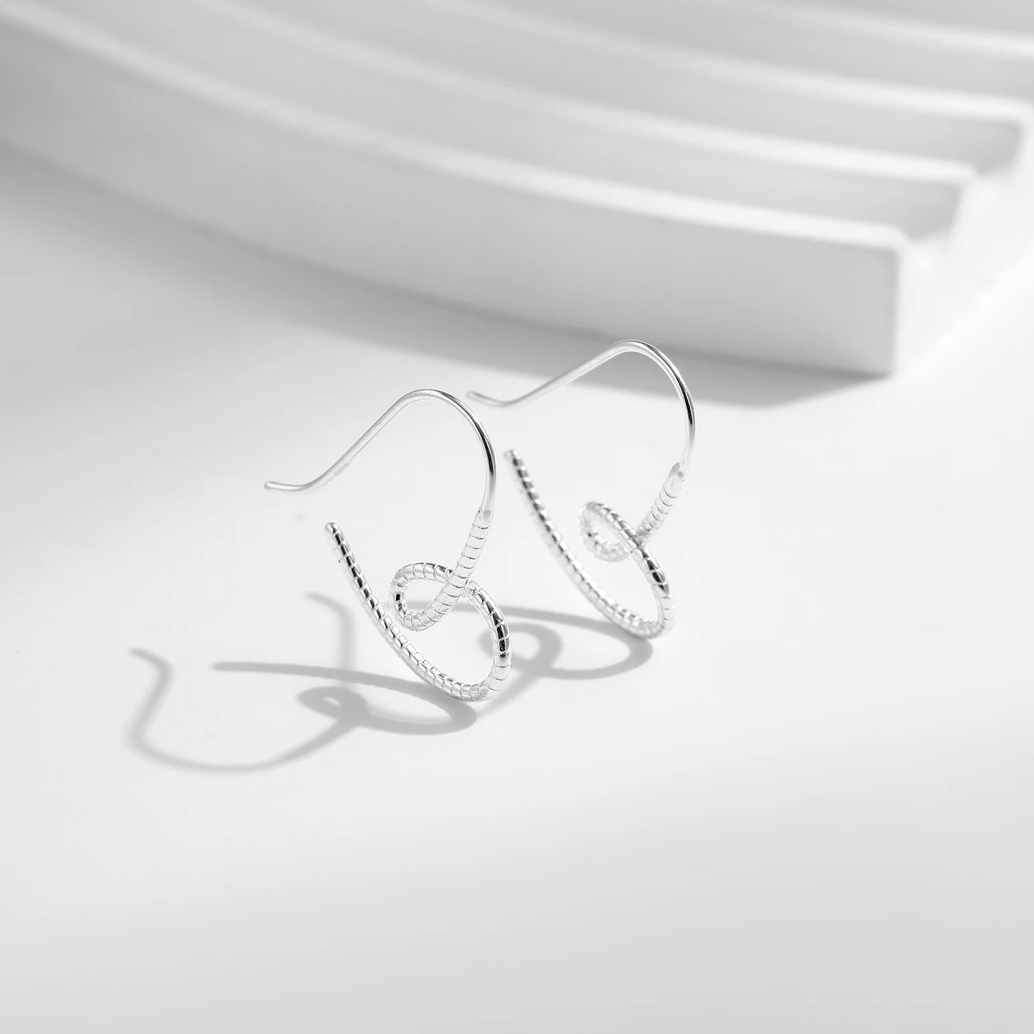 Classic heart hoops with clean vintage lines sterling silver finish