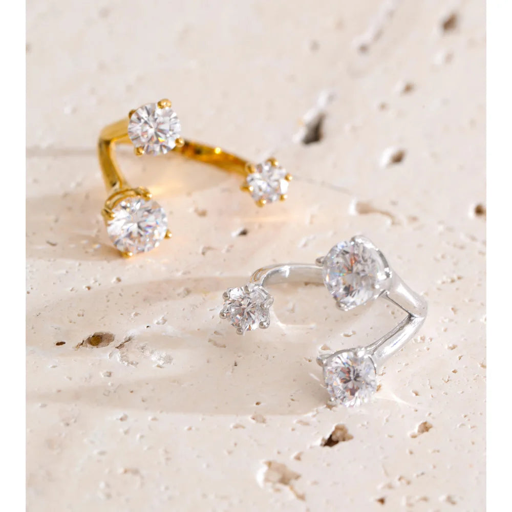 Resizable gold plated cubic zirconia ring on finger close up