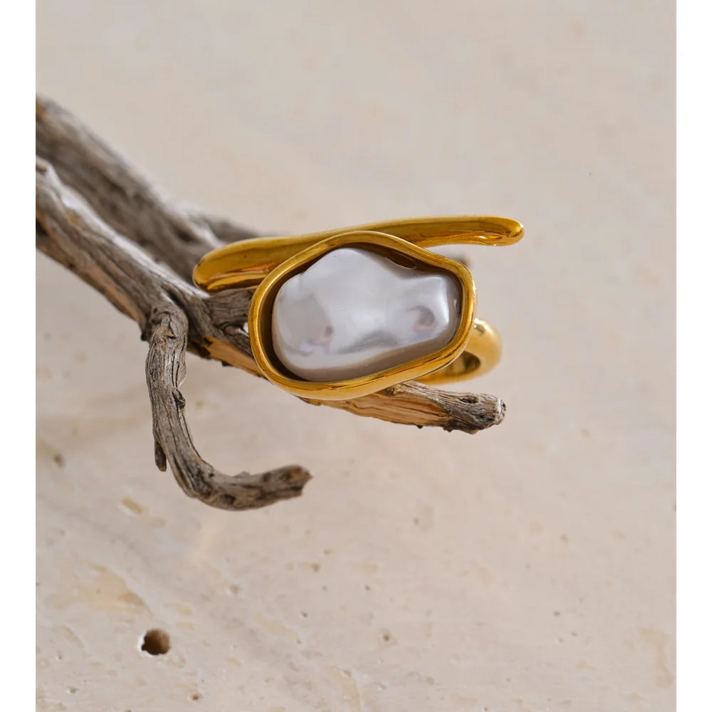Vintage style gold ring with bold baroque pearl centerpiece