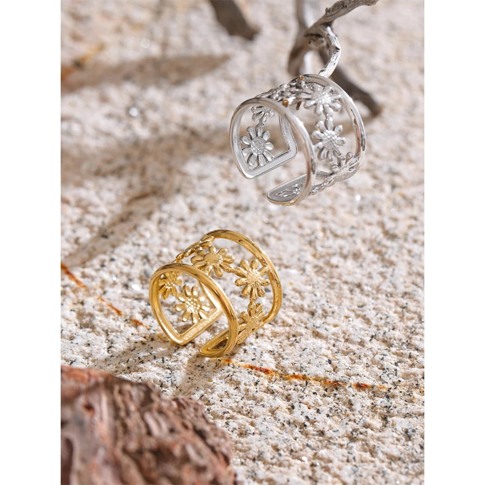 Stainless steel jewelry ring with gold jewelry finish and delicate flower detail