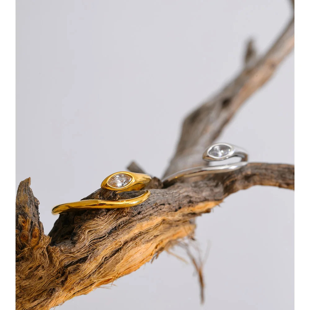 Modern ring with gold finish and sparkling zirconia accents