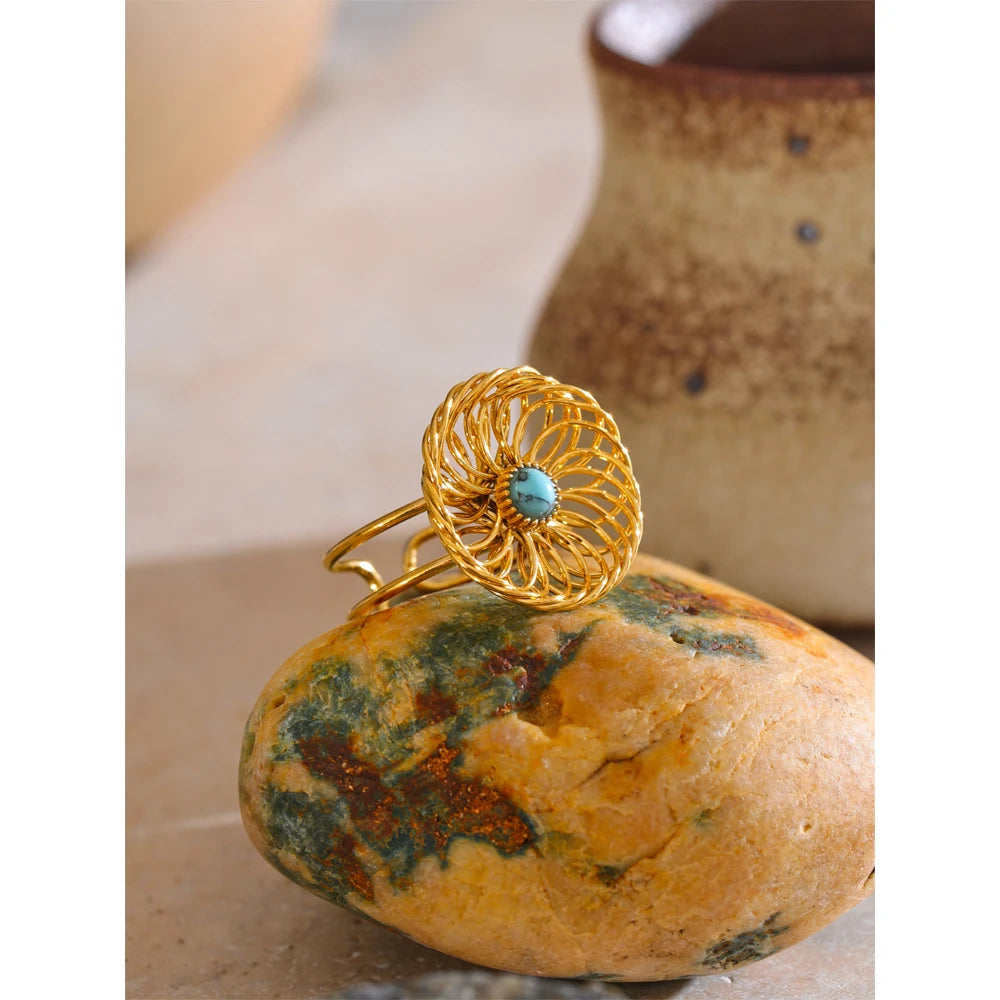 Rings gold rings layered look combining the flower ring with other metallic bands