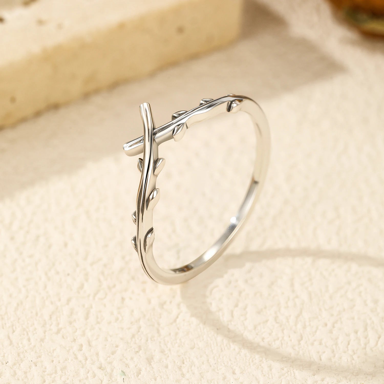 Silver ring on card with ring size guide for accurate ring with size choice