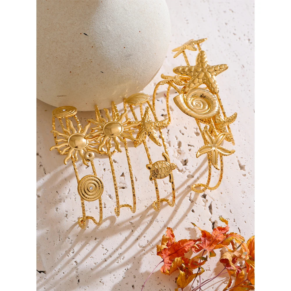 Close view of gold bracelet surface showing polished gold plated finish