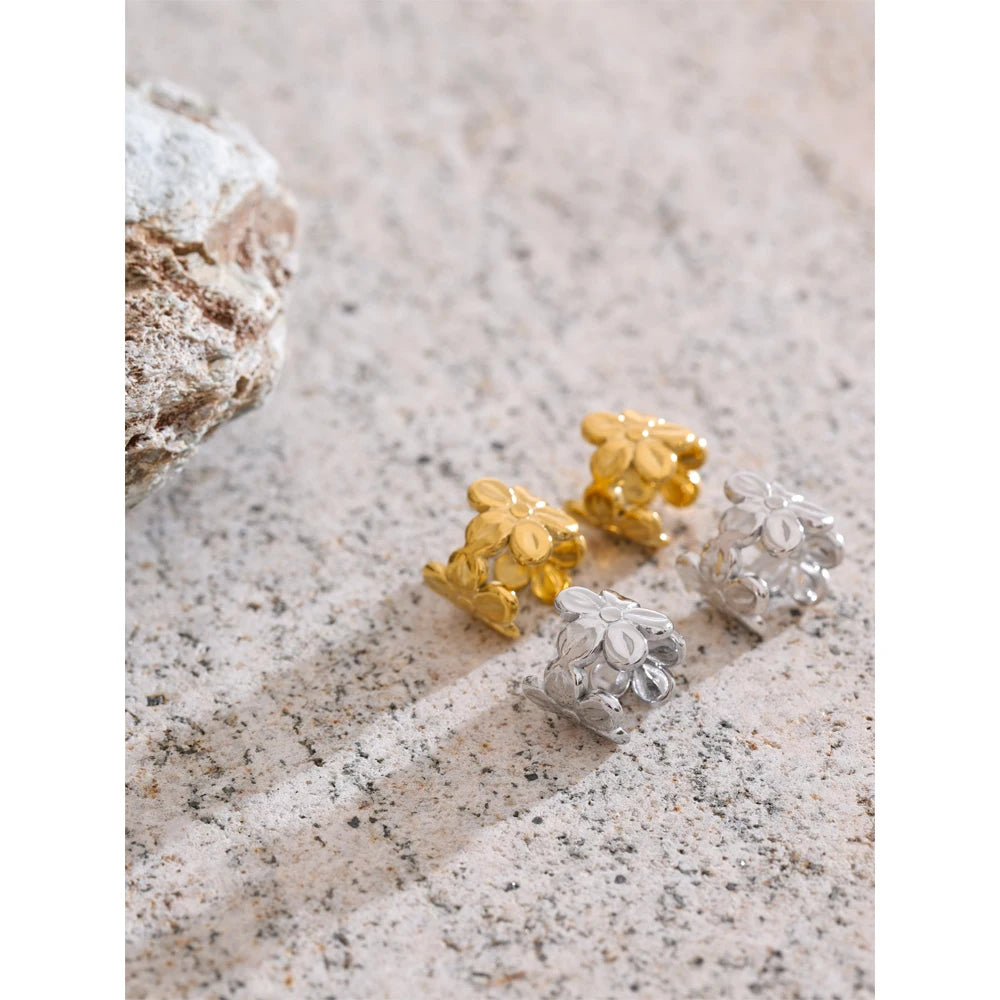 Stainless steel jewelry flower clip on earrings with golden glow