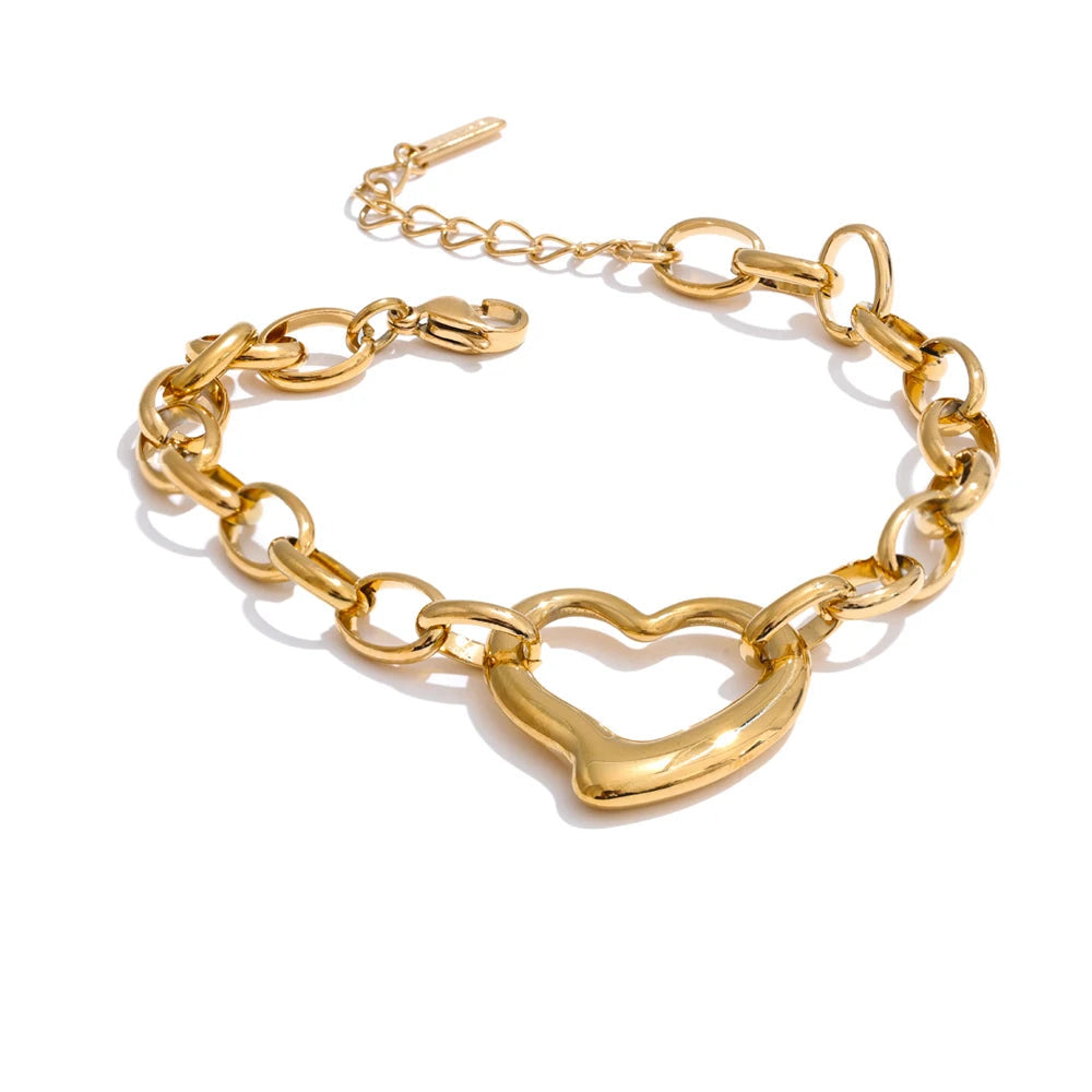 Hollow heart bracelet with love charm on a delicate chain bracelet
