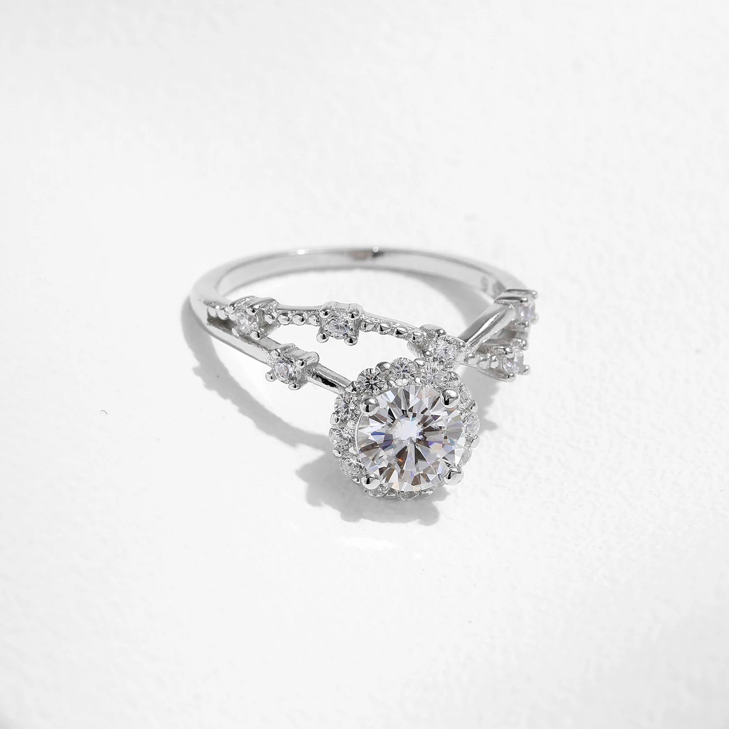 Delicate 925 silver moissanite ring photographed for engagement ring inspiration