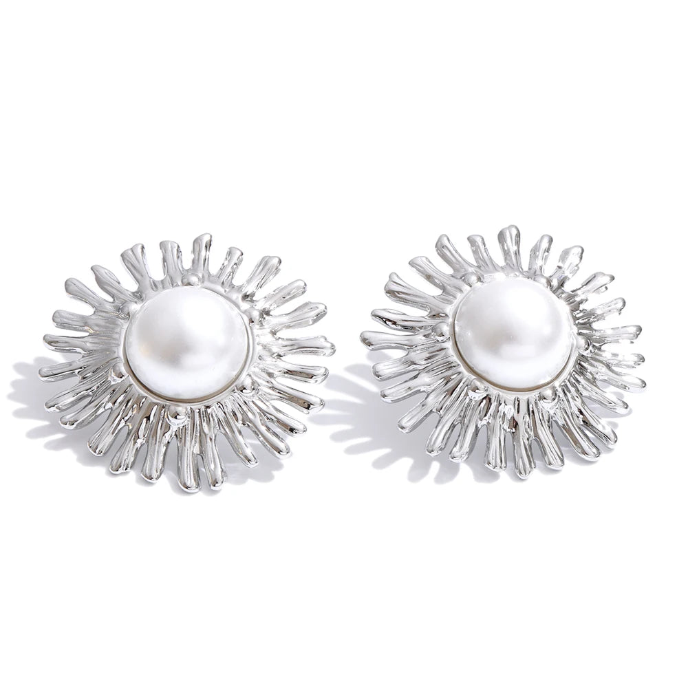 Timeless pearl earrings with stainless steel floral setting