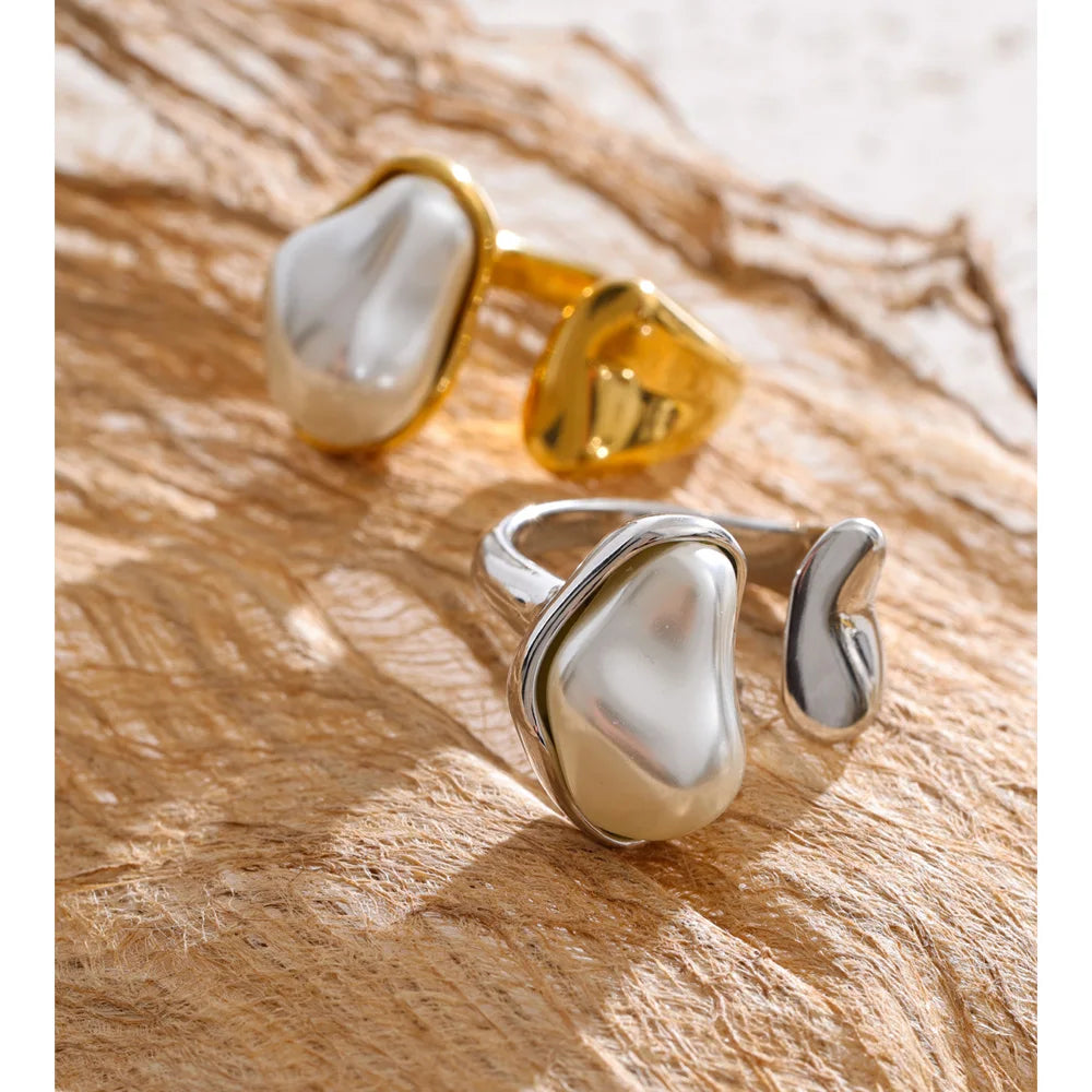 Stainless steel rings featuring baroque pearl design