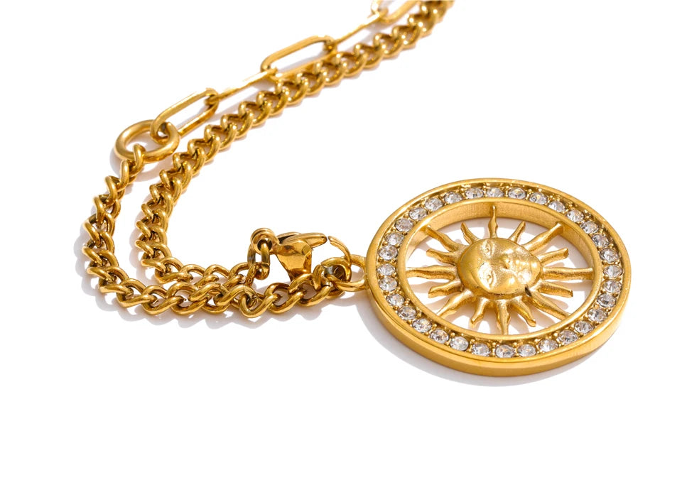 Necklace and necklace layering featuring a sun hollow pendant and gold chain