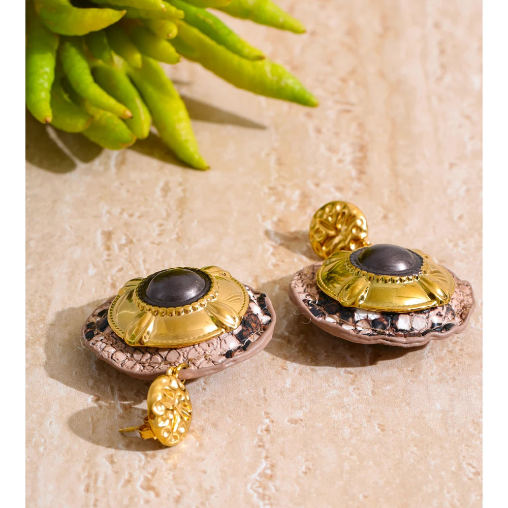 Artistic earring earrings style with snake inspired detail