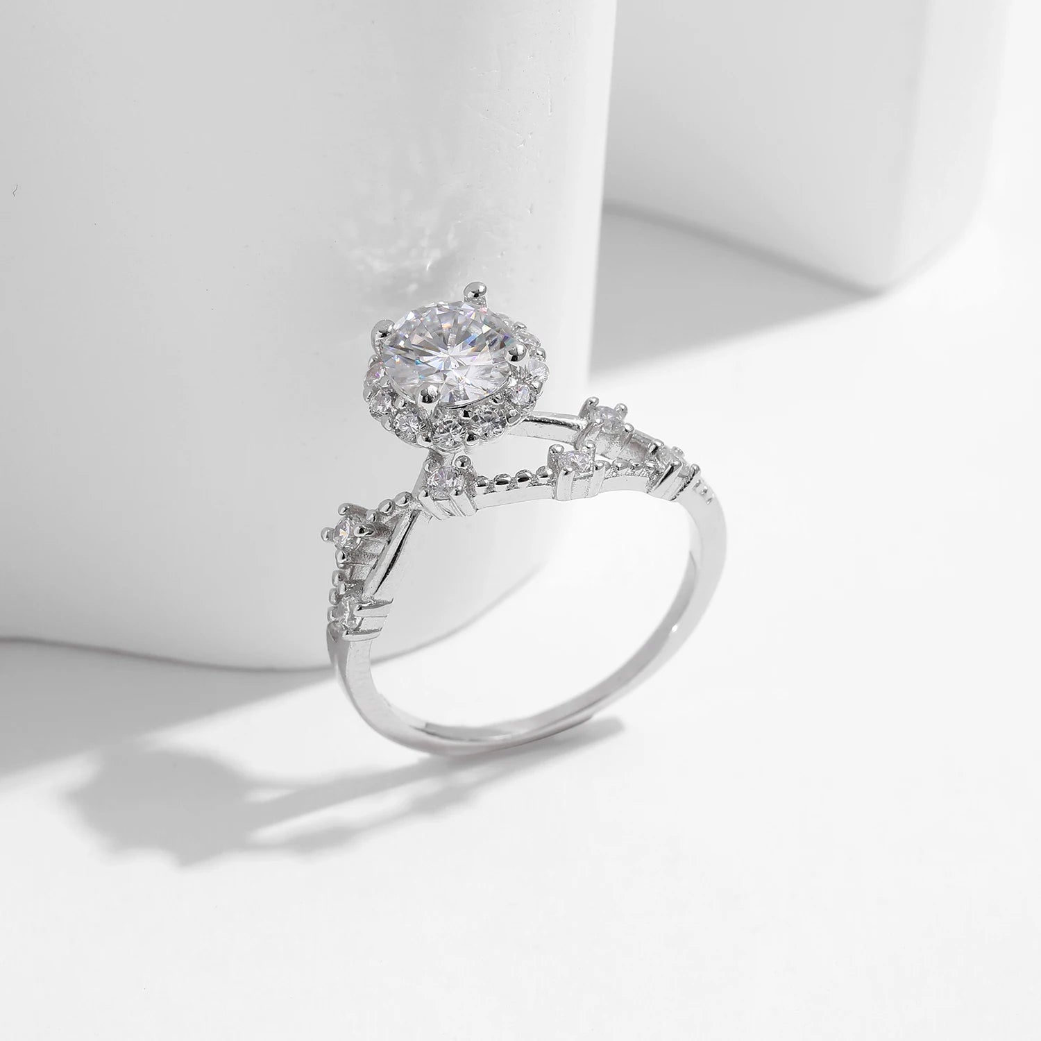 Halo wedding ring with moissanite diamond set in a crown style 925 silver band