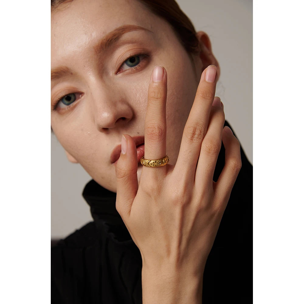 Engraved sun star moon motifs on stainless steel band