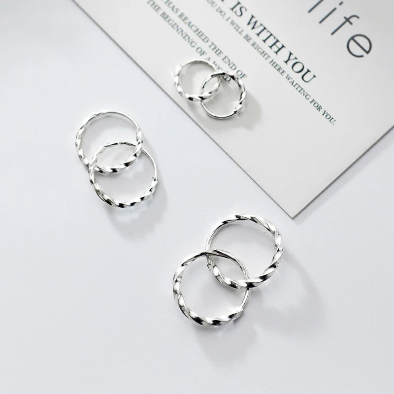 Classic earrings hoop earrings in sterling silver with minimalism twist