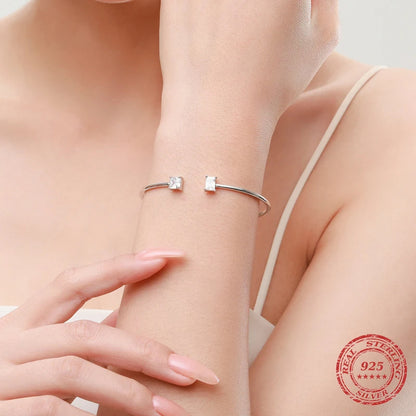 Asymmetric Sparkling Zircon Open Bangle