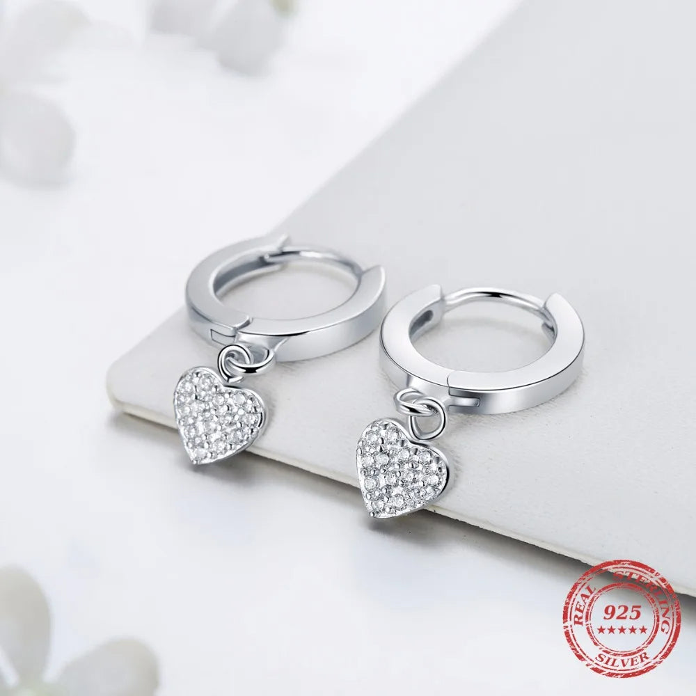 Earrings sets display of dangle earrings gold and heart earrings