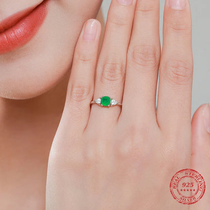 Elegant Glow Sterling Silver Round Emerald Ring